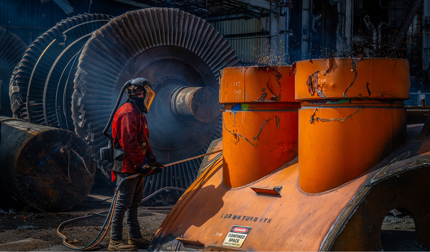 Photo of a worker in an industrial setting